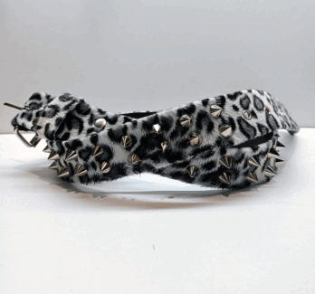 Cinturón pincho leopardo blanco